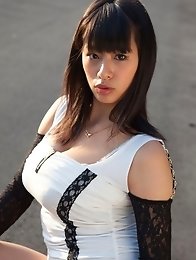 Busty asian Hana Haruna posing outside her natural big breasts!