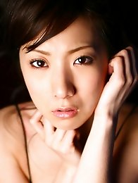 Captivating gravure idol chick seduces in her red lace lingerie